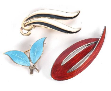 Three Scandanavian brooches: to include a silver and blue enamel leaf brooch by David Andersen, stamped 'D-A, 925 S, Sterling