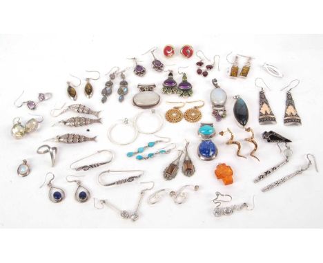 A quantity of mixed silver and gemset to inclue to include a labradorite pendants, amber cross amethyst earrings, garnets, pe