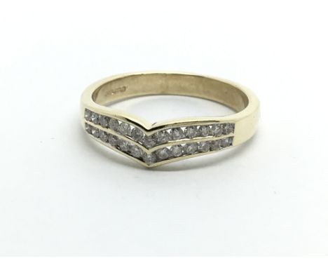 A 9ct gold wishbone ring set with two rows of diamonds, approx .31ct, approx 2.6g and approx size O.