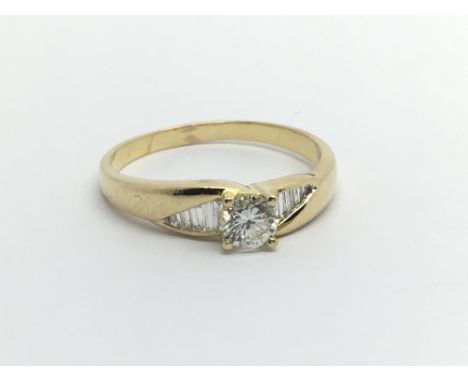 A gold solitaire diamond ring, approx.15ct, approx 2.9g and approx size N-O.