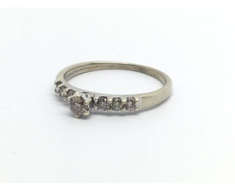 A 9ct gold and champagne diamond set solitaire ring. (M/N).