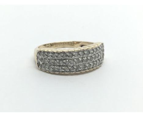 A 9ct gold diamond cluster ring with diamonds in three rows, approx 1/2ct, approx 2.6g and approx size L-M.