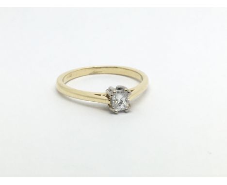 An unmarked gold solitaire diamond ring set with a princess cut diamond, approx .20ct, approx 2.4g and approx size M.