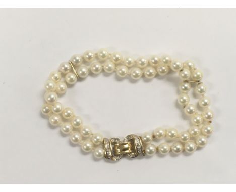A 14ct gold, pearl and diamond bracelet.