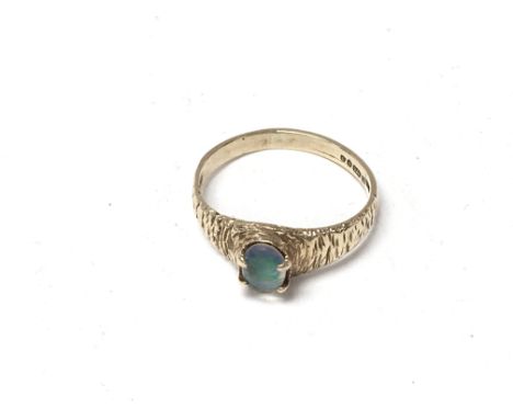 A 9ct gold and opal set ring, K.