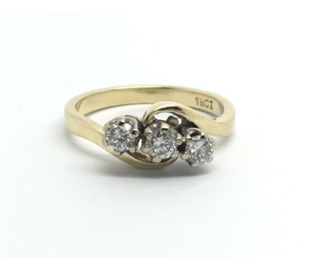 An 18ct gold three stone diamond ring, approx 1/2ct, approx 4.6g and approx size N-O.