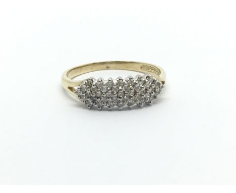 A 9ct gold ring set with three rows of diamonds, approx 23 stones, approx 1.8g and approx size N-O.