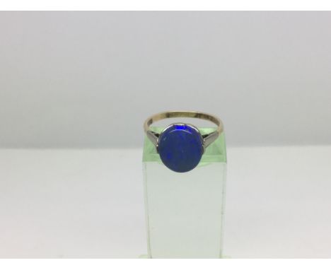 A gold and platinum opal doublet ring, approx 2.4g and approx size P.