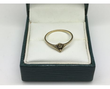 A 9ct gold diamond ring, approx 0.8g and approx size M-N.