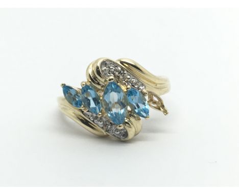 A 9ct gold ring set with topaz and diamonds, missing stone, approx 3.7g and approx size R.