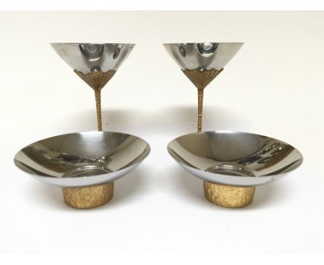 A Pair of Stuart Devlin design for Viners gilt and stainless steel cocktail cups and a pair of matching dishes (4)