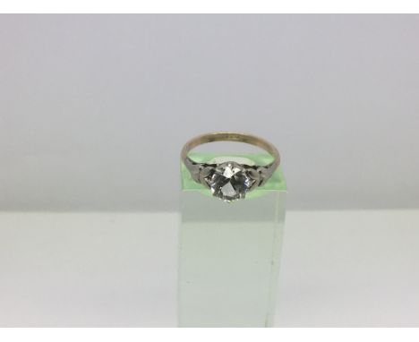 A 9ct gold solitaire ring set with a large clear stone, approx 2.2g and approx size O.