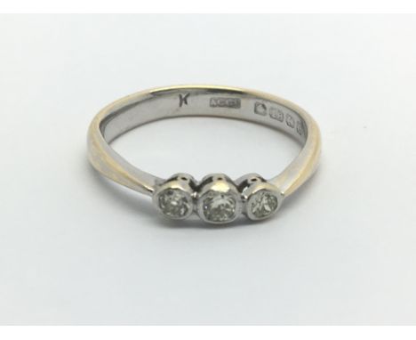 An 18ct gold three stone diamond ring, approx 1.5ct, approx 3g and approx size M.