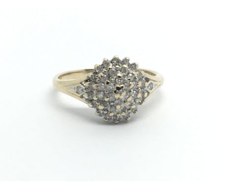 A 9ct gold diamond cluster ring, approx.25ct, approx 2.2g and approx size M-N.