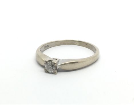 An 18ct white gold solitaire diamond ring, approx 3.2g and approx size P.