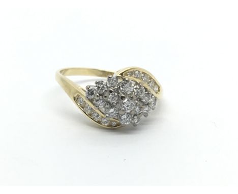 An 18ct gold twenty five stone diamond ring, approx .66ct, approx 4.1g and approx size Q.