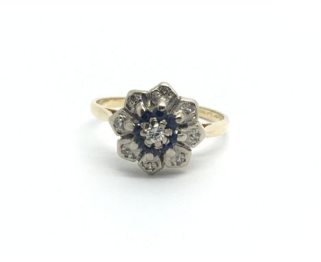 A circa 1950s gold sapphire and diamond cluster ring, approx 3.3g and approx size L.