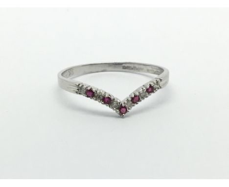 A 9ct white gold ruby and diamond wishbone ring, approx 0.8g and approx size N.