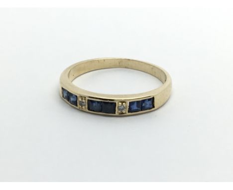 A 9ct gold, sapphire and diamond half eternity ring, approx 1.8g and approx size K- L.