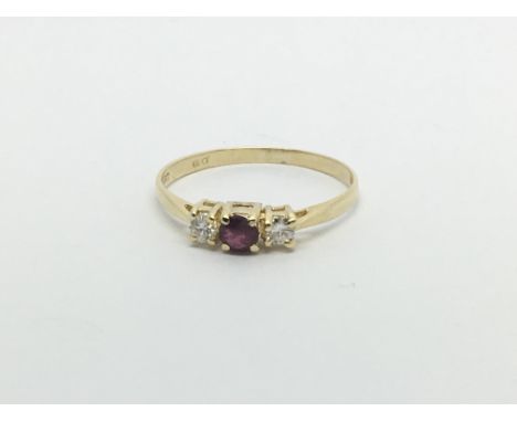 A 14ct gold ruby and diamond ring, approx 1.1g and approx size L.