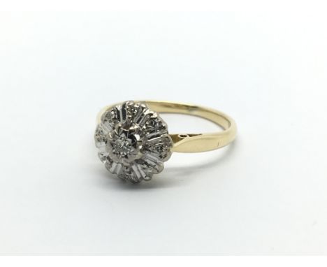 A 9ct gold diamond cluster ring, approx .25ct, approx 3.4g and approx size K.