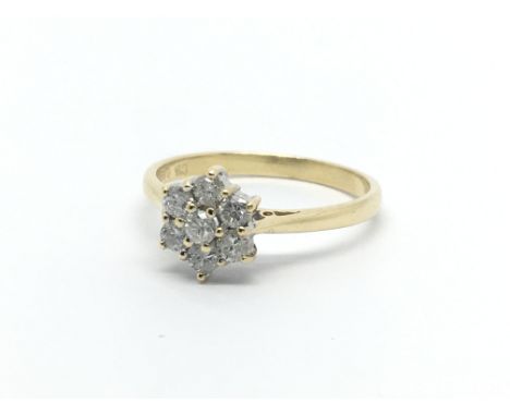 An 18ct gold seven stone diamond ring, approx 1/2ct, approx 3.2g and approx size Q-R.