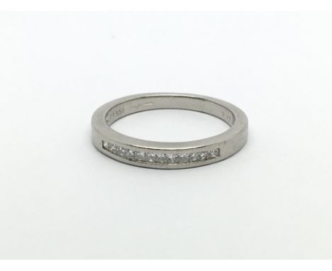 A platinum ring marked 950 and set with diamonds, approx 1/2ct, approx 4.4g and approx size M.