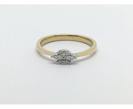 An 18ct gold ring set with four marquise cut diamonds, approx .20ct, approx 2.2g and approx size M.