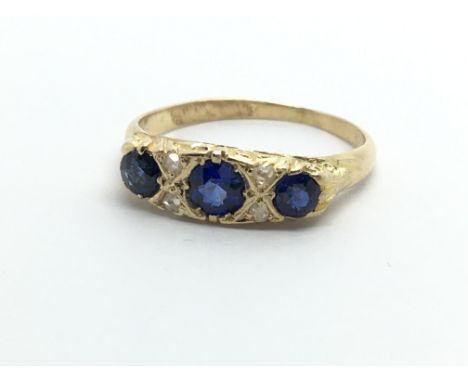 A vintage 18ct gold sapphire and diamond ring, approx 2.7g and approx size L.