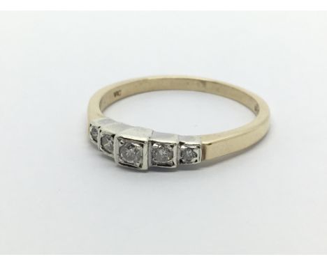 A 9ct gold five stone diamond ring, approx .12ct, approx 2.5g and approx size R-S.