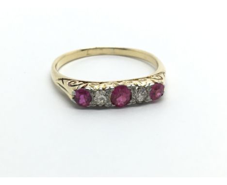 An 18ct gold ruby and diamond ring, approx 2.4g and approx size O-P.