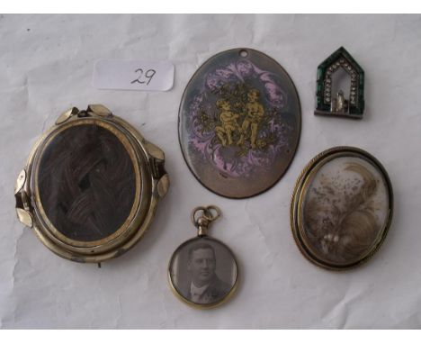 An antique Victorian black enamel and gilt memorial   locket also another etc      