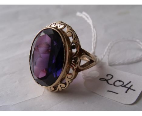 A very large amethyst 18mm x 15mm  ring in 18ct gold fancy mount size 'O'  12.2g         