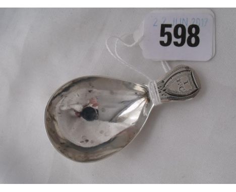 A Georgian caddy spoon with wriggle work terminal   2.5” long         