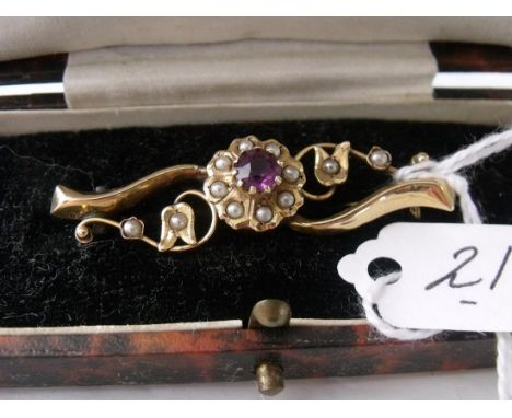 An amethyst and pearl gold mounted antique bar  brooch in fitted box       