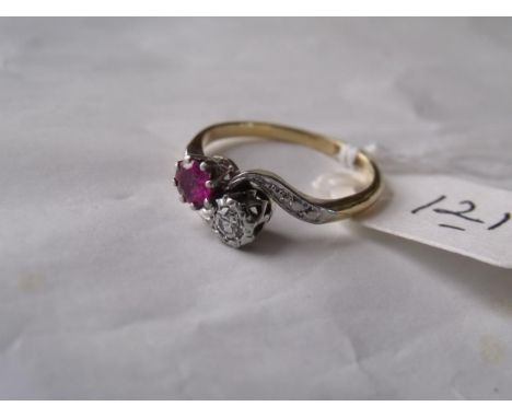 An attractive 18ct gold mounted ruby & diamond   crossover ring approx size 'L'     