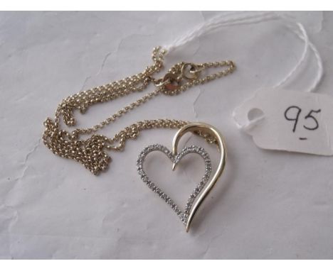 A 9ct & diamond witches heart pendant on 9ct   chain 2.7g        