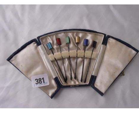 A boxed set six Art Deco cocktail sticks marked silver   