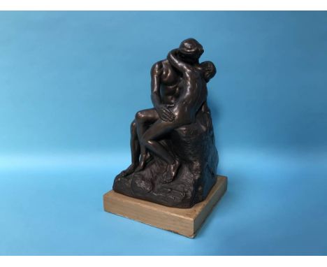 A sculpture of two entwined lovers