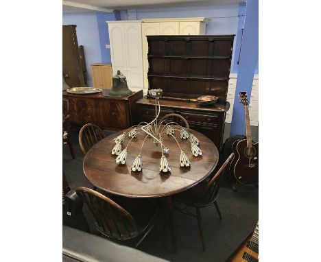 Ercol dining room suite to include dresser, oval table and four chairs