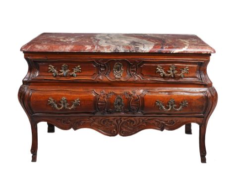  A Louis XV walnut and marble mounted commode  , circa 1750, the rectangular variegated red marble top with rounded corners a