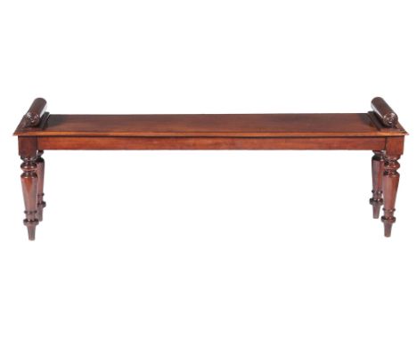  A Victorian mahogany hall bench  , circa 1840, the seat with moulded edge and flanked by rests with bullseye moulded ends ab