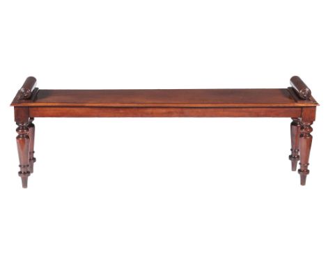  A Victorian mahogany hall bench  , circa 1840, the seat with moulded edge and flanked by rests with bullseye moulded ends ab