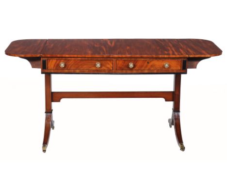  A George III mahogany and ebony strung sofa table  , circa 1790, the rectangular top incorporating a pair of hinged leaves, 