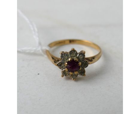 9ct gold (stamped 375) ruby and diamond cluster ring, overall weight 1.6 grams