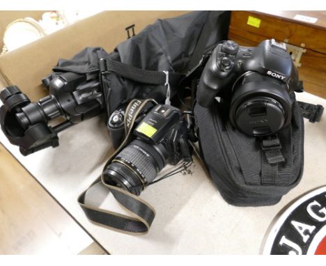 Amazon Basics tripod, Sony Cybershot camera and Fuji Film Finepix S9600 camera