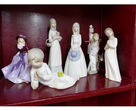 Collection of six Nao and other figurines