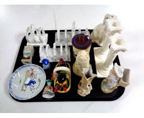 A tray containing antique and later china to include ceramic toast rack, Staffordshire dog, continental figure, Japanese egg 