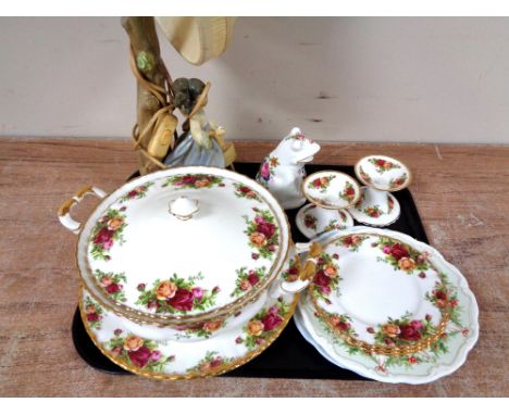 A tray of Nao figural table lamp and shade, nine pieces of Royal Albert Old Country Roses dinner ware and pair of candlestick