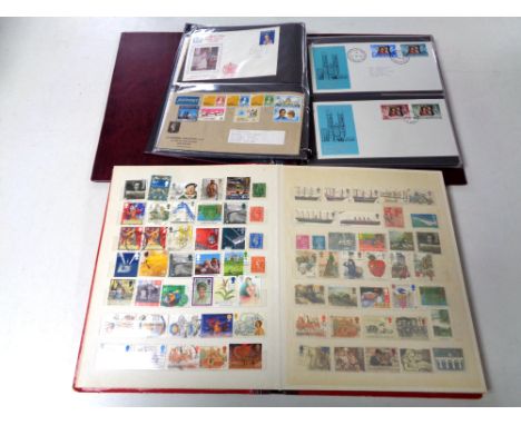 A box of six stock book collections of world stamps, album of Royal Mail first day covers 